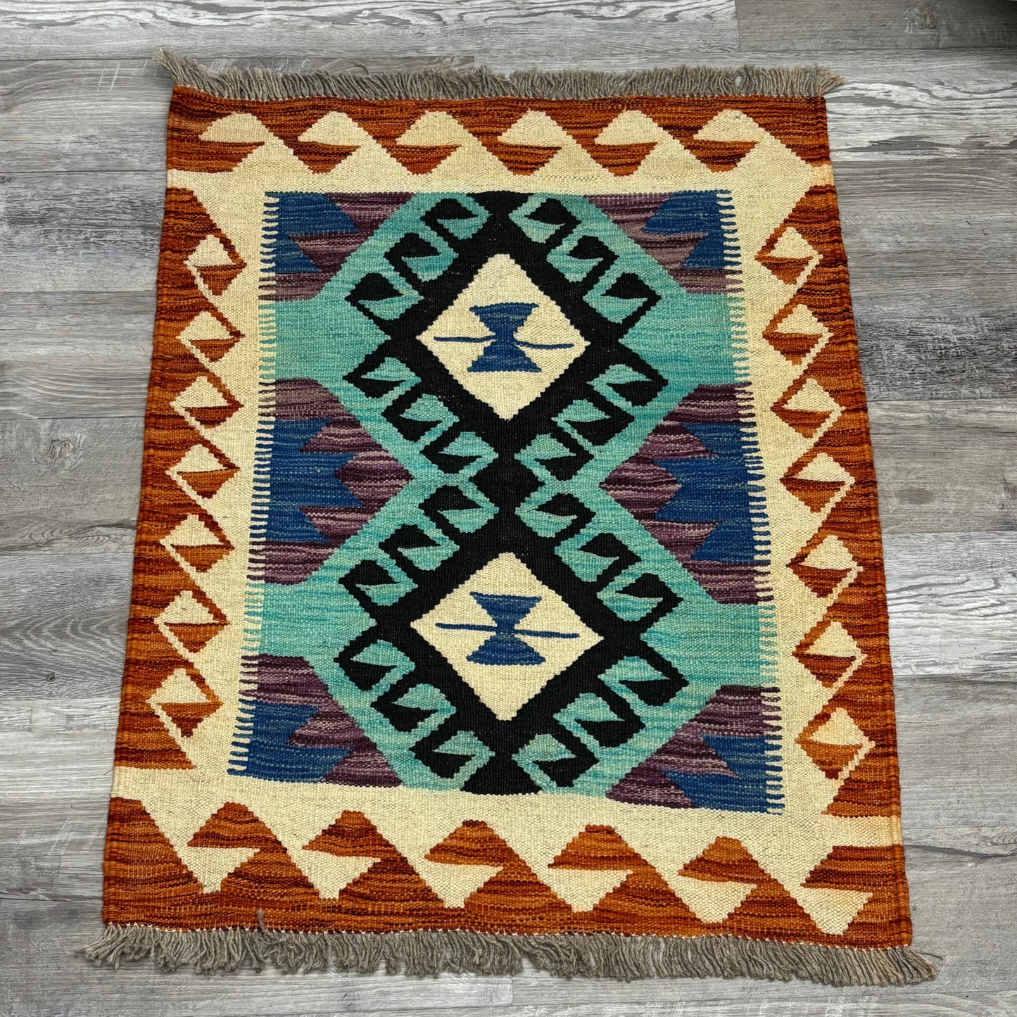 Small Orange/Teal Rug